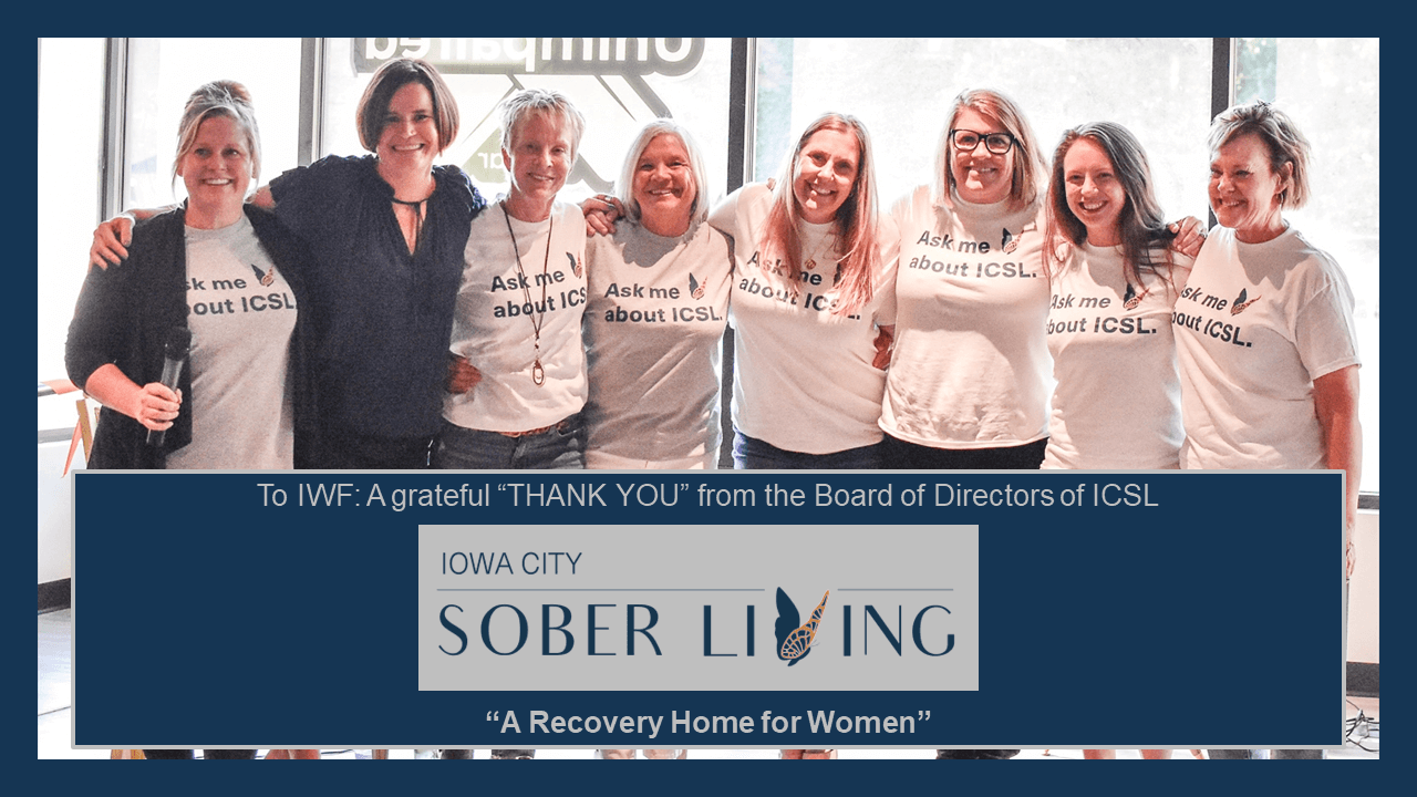 8 women advocates of Iowa City Sober Living posed together for a group photo