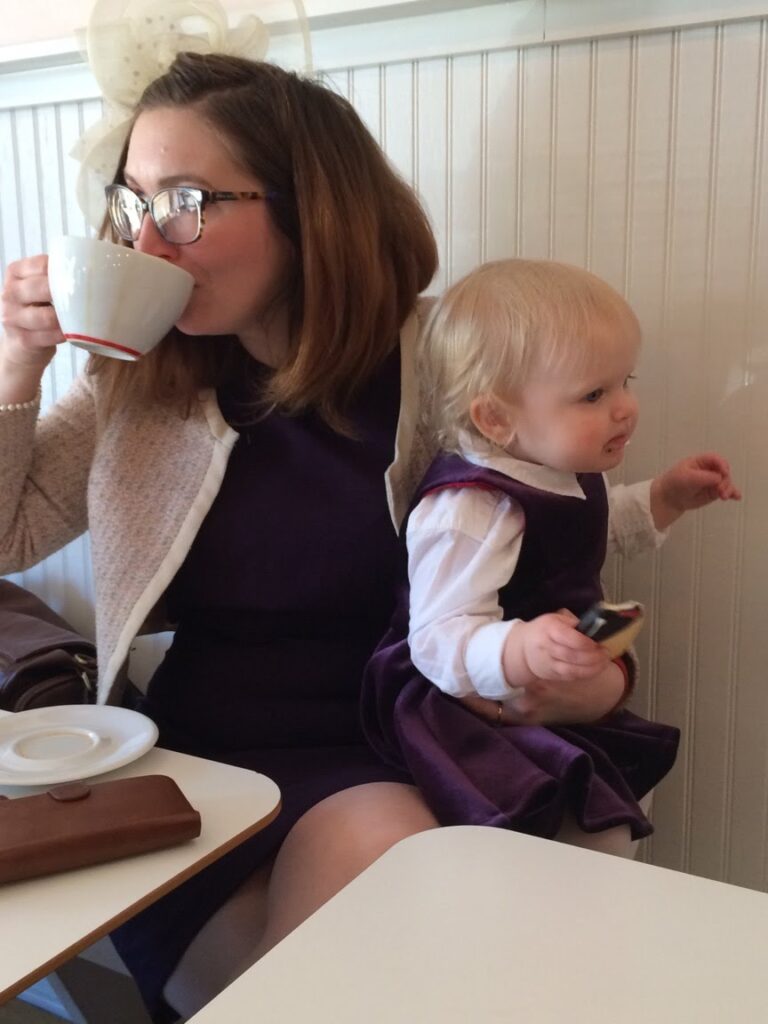 Alicia Mayberry drinks coffee with her daughter